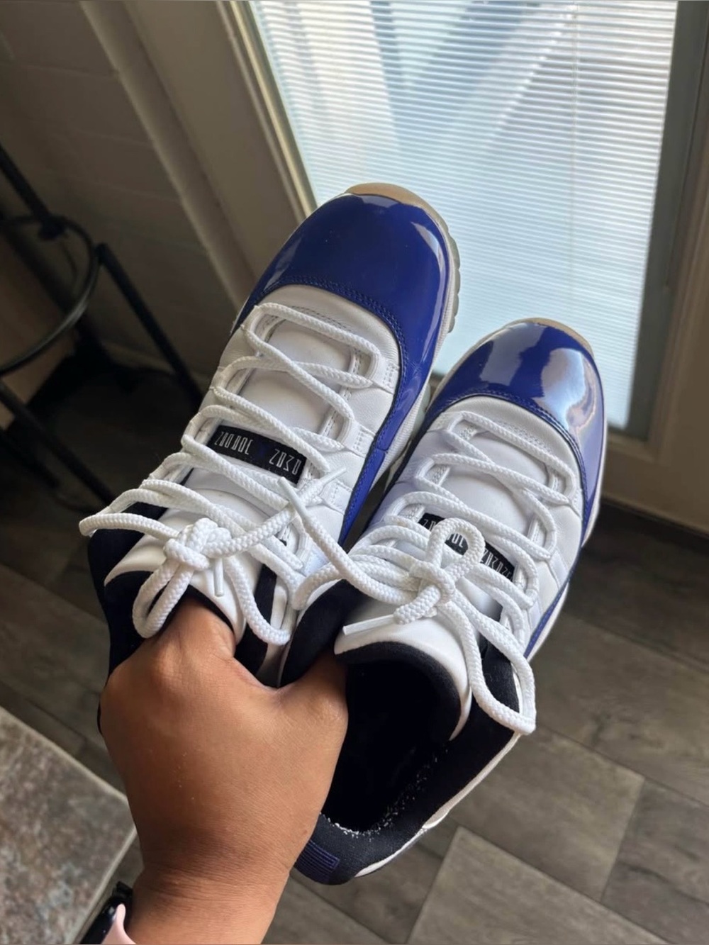 Jordan Women's Low-Top Sneakers in White and Royal Blue